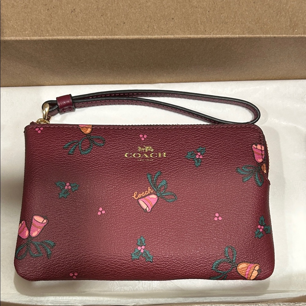 Coach Maroon Wristlet with Holly and Bell design